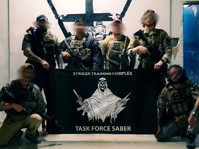 Striker Training Complex team with flag